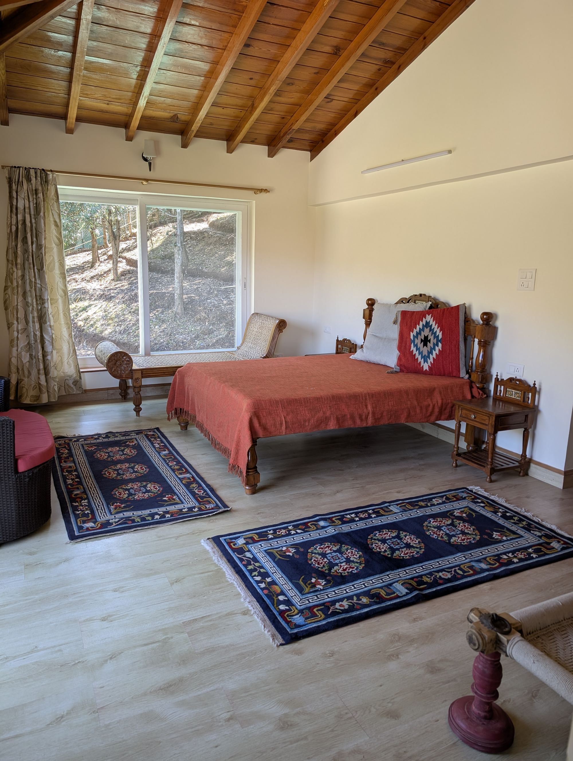 Room Two, The Forest View — terracotta bedspread and rugs
